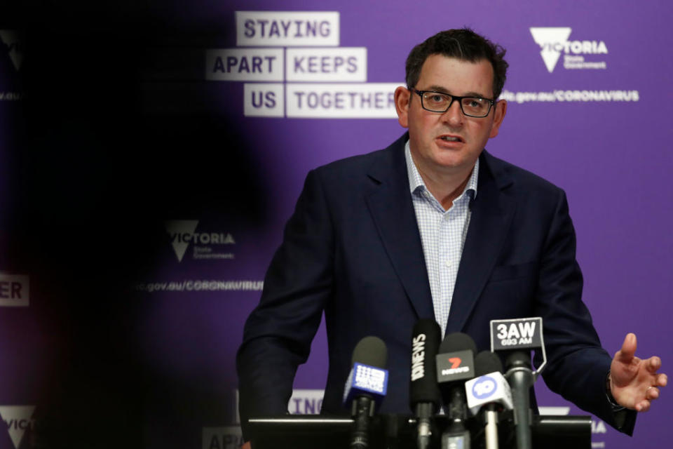 Victorian Premier Daniel Andrews seen at press conference announcing Stage 4.