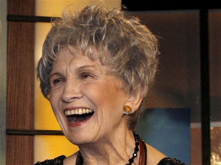 File photo of Canadian writer Alice Munro smiling at the end of the Giller awards ceremony in Toronto in this November 6, 2007.REUTERS/Mike Cassese/Files