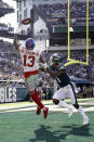 <p>New York Giants’ Odell Beckham, left, catches a touchdown against Philadelphia Eagles’ Jalen Mills during the second half of an NFL football game, Sunday, Sept. 24, 2017, in Philadelphia. (AP Photo/Matt Rourke) </p>