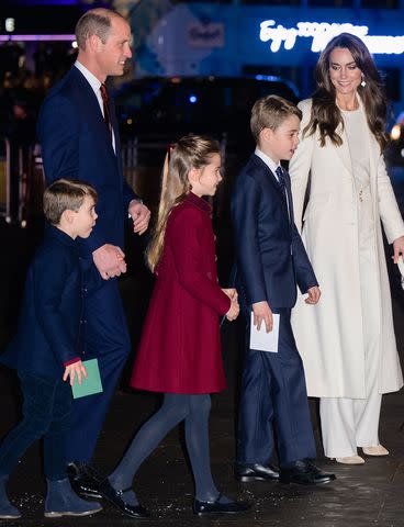 <p>Samir Hussein/WireImage</p> Kate Middleton and Prince William with their three kids — Prince Louis, Princess Charlotte and Prince George.