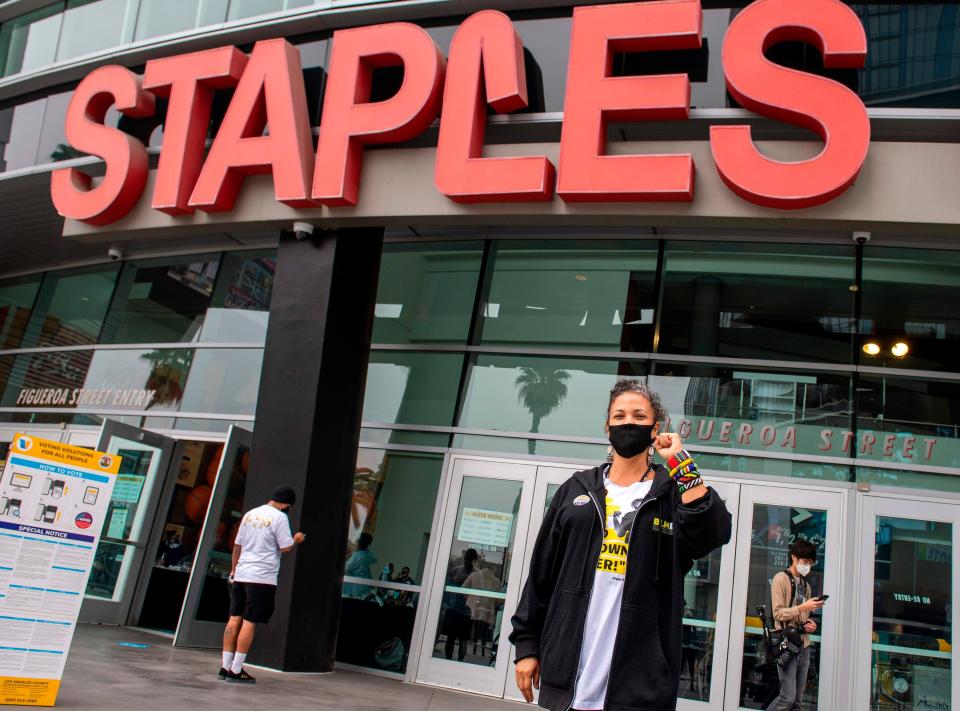 Civic leader and co-founder of the Black Lives Matter Los Angeles chapter, Melina Abdullah, poses for a photo after voting at the Staples Center early on November 3.