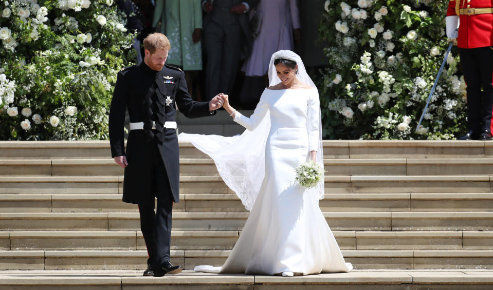 The Duchess of Sussex, née Meghan Markle, married Prince Harry in an off-the-shoulder Givenchy dress in May 2018. (Getty Images)