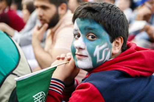 Saudi Arabia supporters kept tabs on their team in the World Cup curtain-raiser