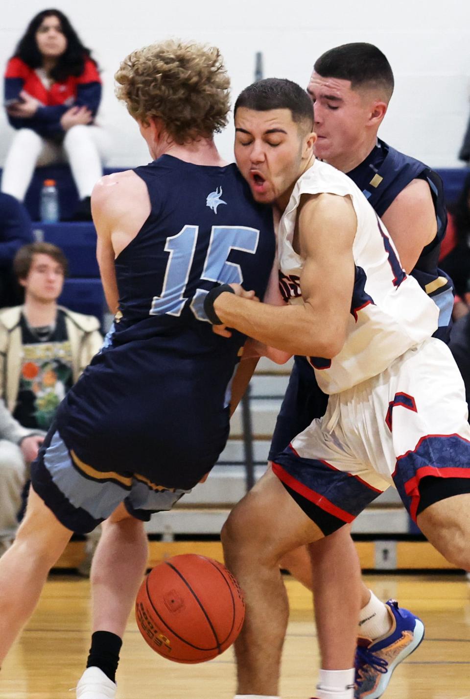 Rockland's Jordan DePina, right, collides with East Bridgewater defender Aidan Toomey during a game on Tuesday, Jan. 17, 2023.