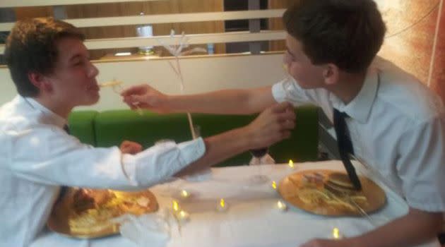 The boys brought their own tablecloth, cutlery and crockery to a local McDonald's in order to put a fine-dining spin on their experience. Photo: Twitter