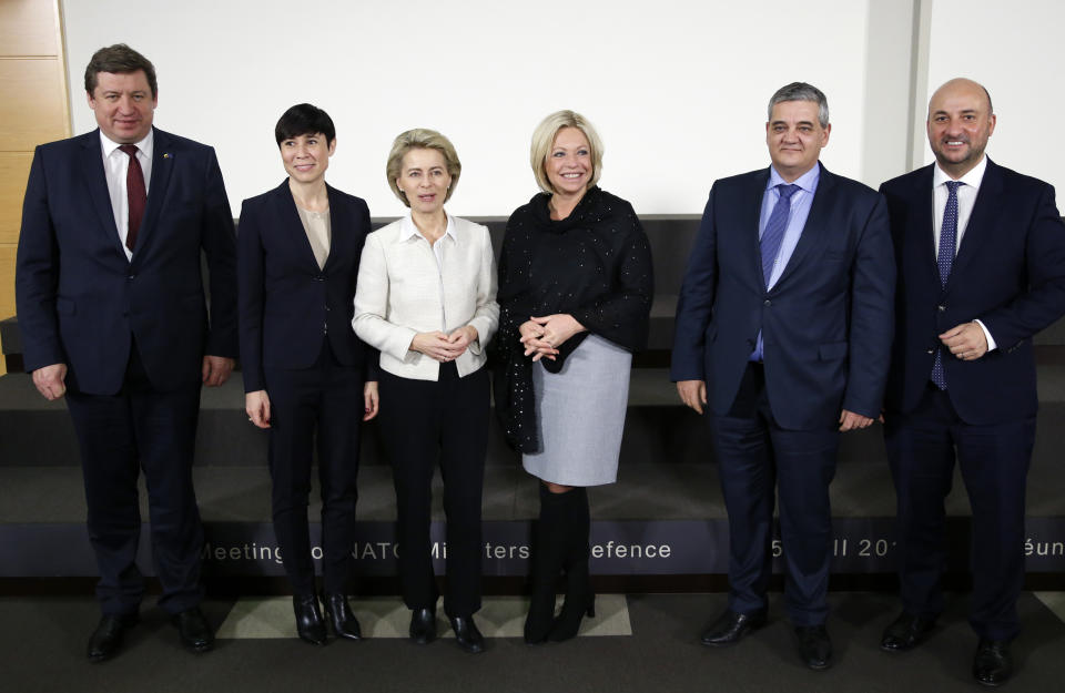 From left, Lithuania's Defense Minister Raimundas Karoblis, Norway's Defense Minister Ine Marie Eriksen Soreide, German Defense Minister Ursula von der Leyen, Dutch Defense Minister Jeanine Hennis-Plasschaert, Belgium's Defense Minister Steven Vandeput and Luxembourg's Defense Minister Etienne Schneider pose before signing a european military cooperation agreements at NATO headquarters in Brussels, on Thursday, Feb. 16, 2017. (Francois Lenoir, Pool Photo via AP)