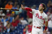 Philadelphia Phillies' Bryce Harper reacts after striking out against Pittsburgh Pirates pitcher Sam Howard during the first inning of a baseball game, Friday, Sept. 24, 2021, in Philadelphia. (AP Photo/Matt Slocum)