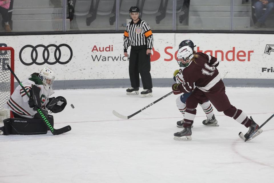 SCMB goalie Ava Porter stops a shot by La Salle in Sunday's championship game. She made 16 saves and was the game’s MVP.