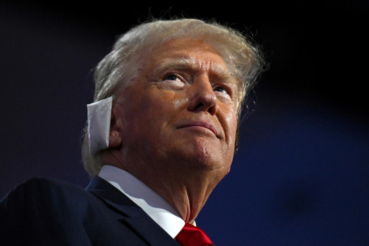 Former President Donald Trump looks on during a surprise appearance at the Republican National Convention.