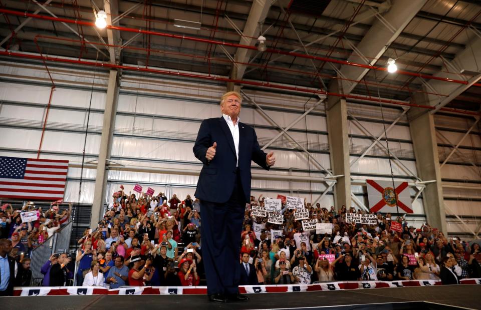 <p>U.S. President Donald Trump applauds his crowd as he holds a “Make America Great Again” rally at Orlando Melbourne International Airport in Melbourne, Florida, February 18, 2017. (REUTERS/Kevin Lamarque) </p>