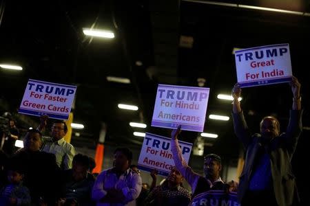 People wait for Republican presidential nominee Donald Trump to take the stage at a Bollywood-themed charity concert put on by the Republican Hindu Coalition in Edison, New Jersey, U.S. October 15, 2016. REUTERS/Jonathan Ernst