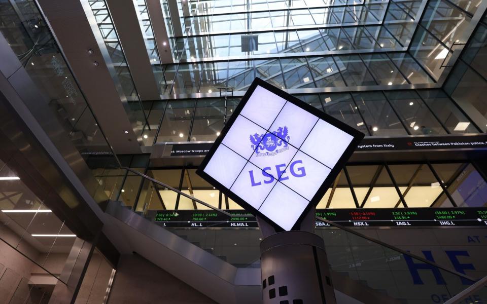 The logo of London Stock Exchange Group Plc in the office atrium in the City of London, UK - Hollie Adams/Bloomberg