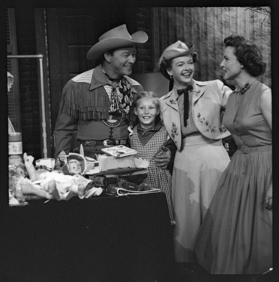 <p>White has always recognized the importance of giving back. Here she is taking a deserving young child to meet Roy Rogers and Dale Evans. </p>