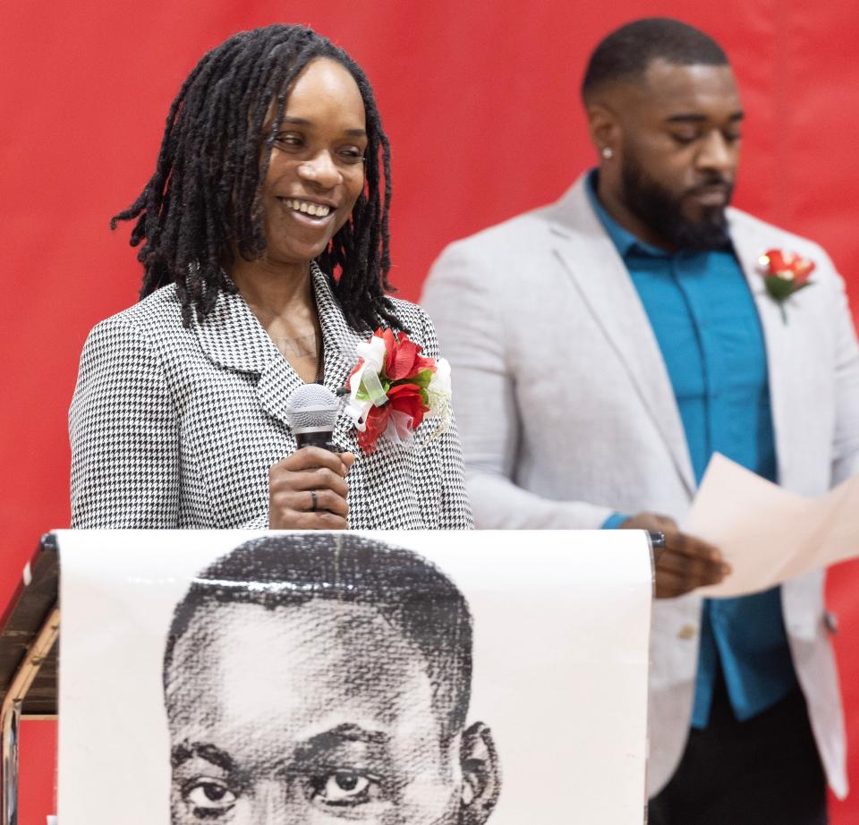 Tina Stevens speaks Monday after receiving a Community Service Award at the 49th annual Martin Luther King Jr. Community Celebration held at the Edward "Peel" Coleman Center in Canton.