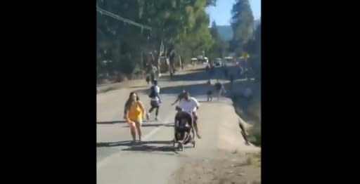 This screen grab shows people running away from gunshots during the Gilroy garlic festival