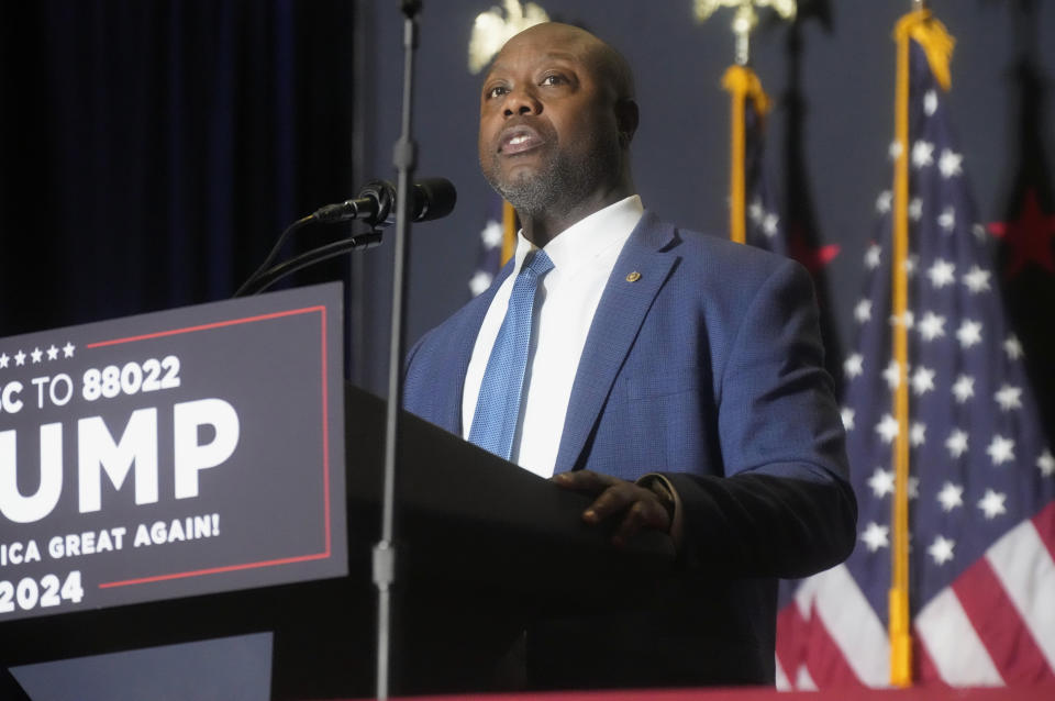 FILE - Sen. Tim Scott, R-S.C., speaks at a campaign rally, Feb. 14, 2024, in North Charleston, S.C. In some cases, Donald Trump's potential vice presidential contenders have had to abandon long-held policy positions and recant vehement criticism. In 2016, Scott excoriated Trump for his reluctance to condemn the Ku Klux Klan, his attacks on a judge's Mexican heritage, and comments equivocating about the 2017 white nationalist rally in Charlottesville, Virginia. (AP Photo/Meg Kinnard, File)