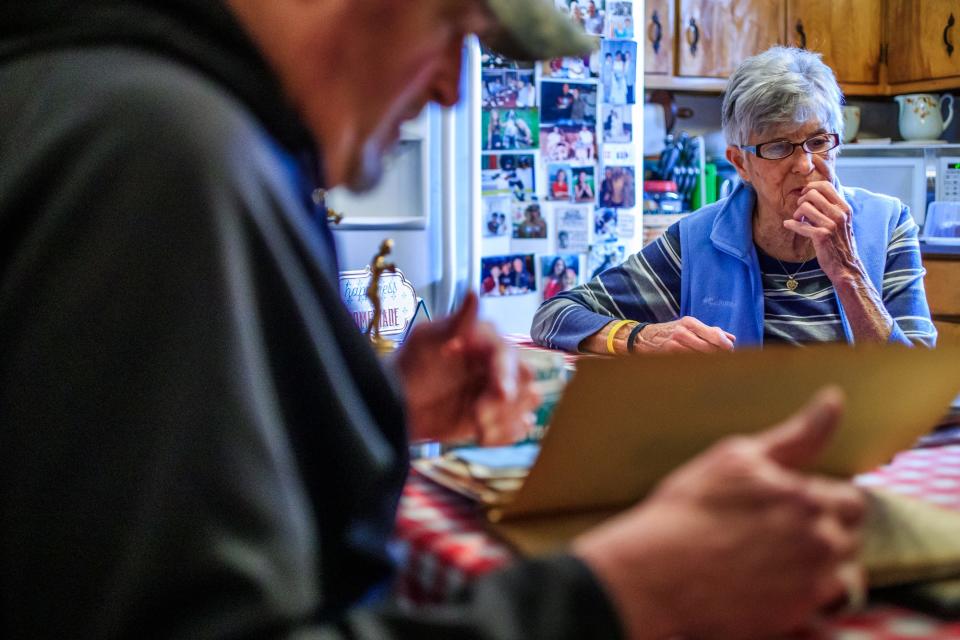 Patty Tatum McDonald started playing softball in her backyard when she was 12 years old with her father. u0022We had a bucket of balls and I would go pitch,u0022 she said Tuesday, March 8, 2022, while thumbing through old softball scrapbooks with her son, Brian.