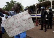 Zimbabwean citizens protest outside the South African Embassy in Harare against a wave of violence against immigrants in parts of South Africa on April 17, 2015