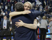 FILE - In this March 28, 2016, file photo, Connecticut assistant coach Shea Ralph embraces coach Geno Auriemma after UConn defeated Texas in the regional final of the women's NCAA basketball tournament in Bridgeport, Conn. Vanderbilt has hired Shea Ralph away from UConn to help revive the Commodores' struggling women's basketball program. Athletic director Candice Lee announced the hiring Tuesday morning, April 13, 2021, a week after firing Stephanie White. (AP Photo/Jessica Hill, File)