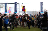 Horse Racing - Cheltenham Festival - Cheltenham Racecourse, Cheltenham, Britain - March 16, 2018 Richard Johnson on Native River celebrates after winning the 15.30 Timico Cheltenham Gold Cup Chase Action Images via Reuters/Andrew Boyers