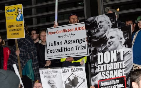 Assange supporters protesting outside the UK Home Office on Nov 5 - Credit: Wiktor Szymanowicz / Barcroft Media