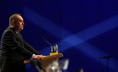 Scotland's First Minister Alex Salmond delivers his speech at the Scottish National Party (SNP) Spring Conference in Aberdeen, Scotland April 12, 2014. REUTERS/Russell Cheyne