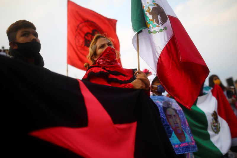 Relatives of the 43 missing students of the Ayotzinapa Teacher Training College march on the 6th anniversary of their disappearance in Mexico City