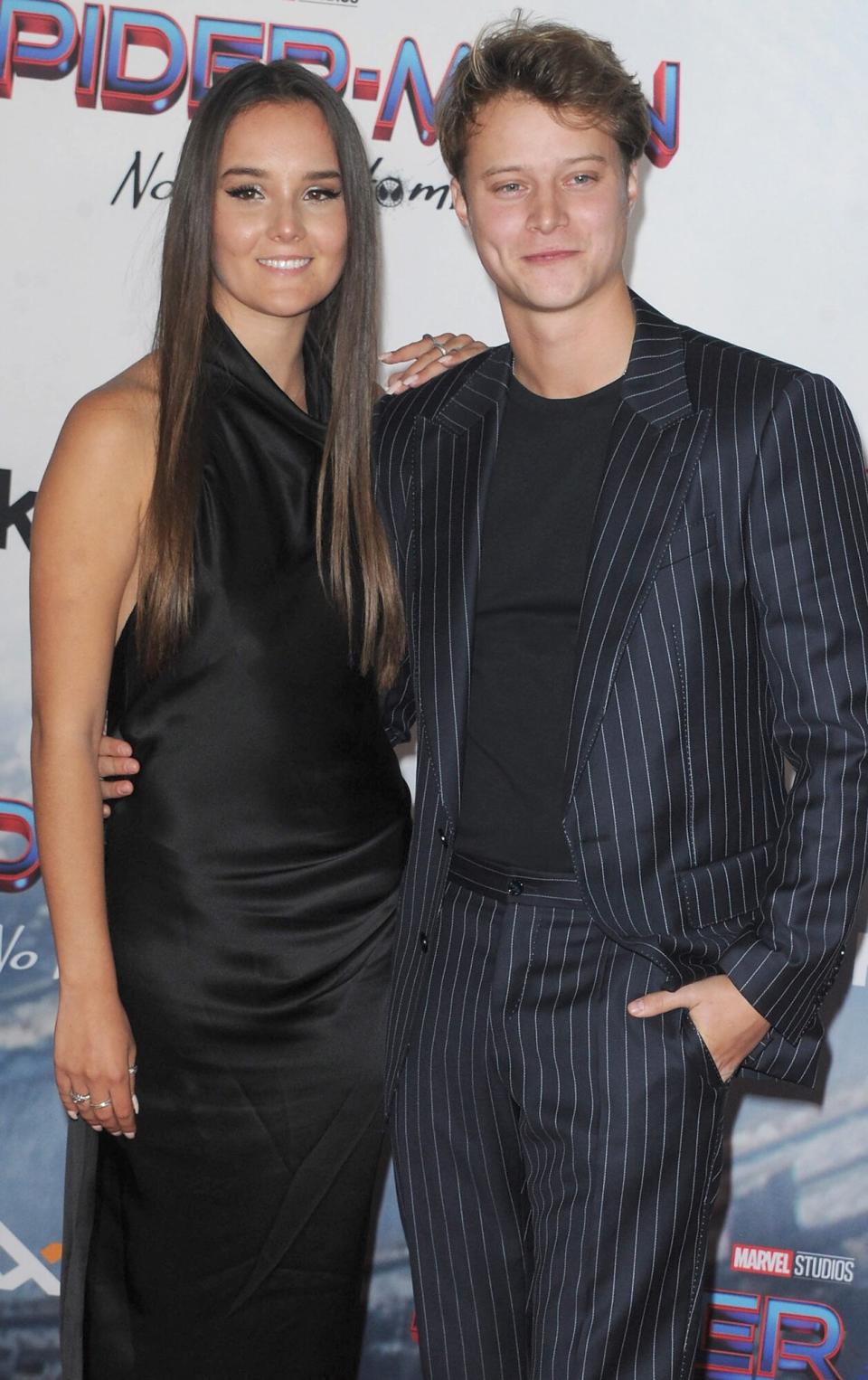 Rudy Pankow and Elaine Siemek attend Sony Pictures' "Spider-Man: No Way Home" Los Angeles Premiere held at The Regency Village Theatre on December 13, 2021 in Los Angeles, California