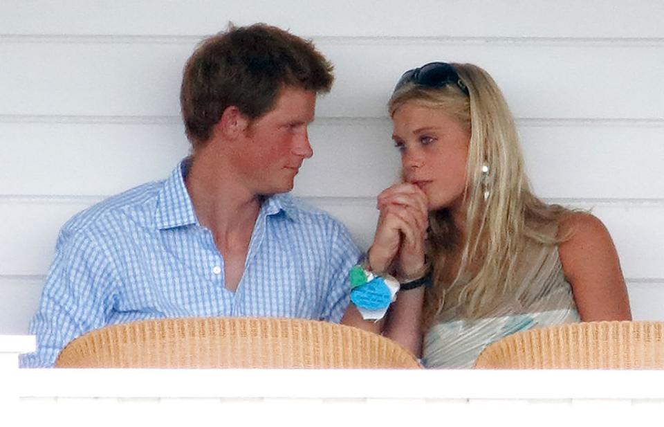 Prince Harry holding hands with Chelsy Davy