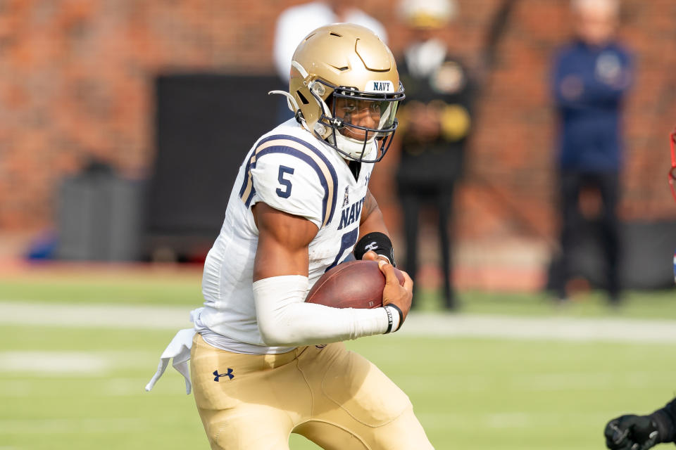 DALLAS, TX - NOVEMBER 25: Navy Midshipmen quarterback Braxton Woodson (5) scrambles during a college football game between the Navy Midshipmen and Southern Methodist Mustangs on November 25, 2023 at Gerald Ford Stadium in Dallas, TX.  (Photo by Chris Leduc/Icon Sportswire via Getty Images)