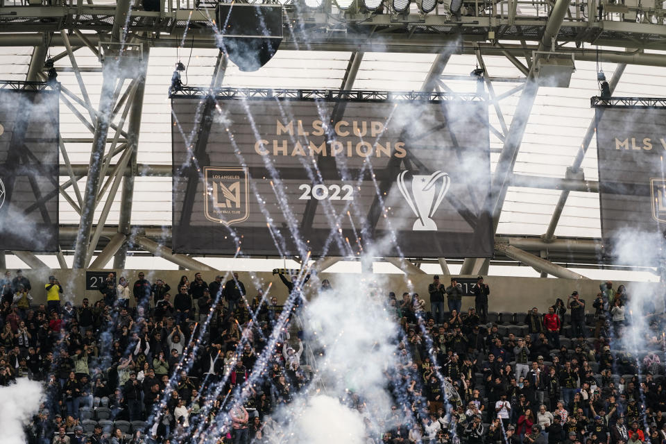 A banner celebrating Los Angeles FC's 2022 MLS Championship title is unveiled before the team's MLS soccer match against the Portland Timbers, Saturday, March 4, 2023, in Los Angeles. (AP Photo/Jae C. Hong)