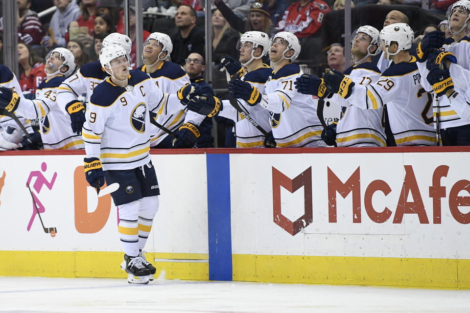 Buffalo Sabres center Jack Eichel (9) celebrates this goal during the second period of an NHL hockey game against the Washington Capitals, Saturday, Dec. 15, 2018, in Washington. (AP Photo/Nick Wass)