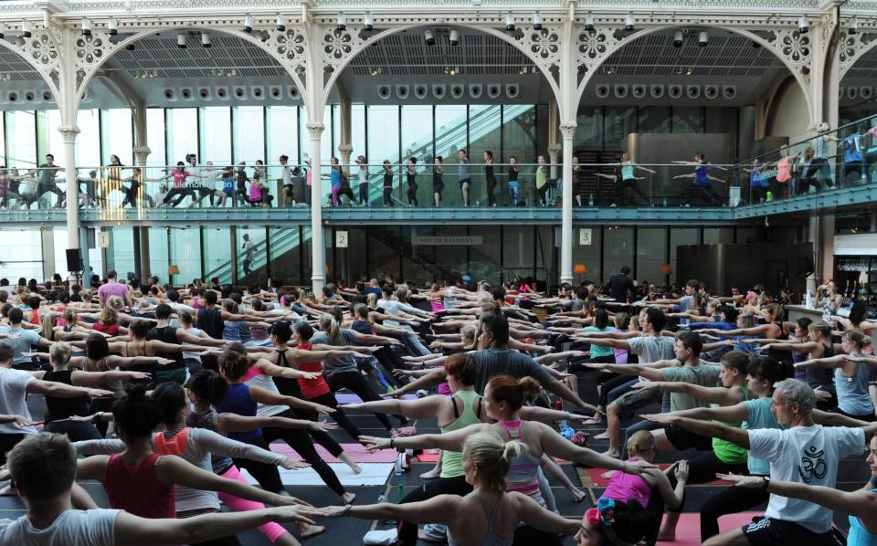 Lululemon hosts a yoga class for hundreds of people at the Royal Opera House, 2014