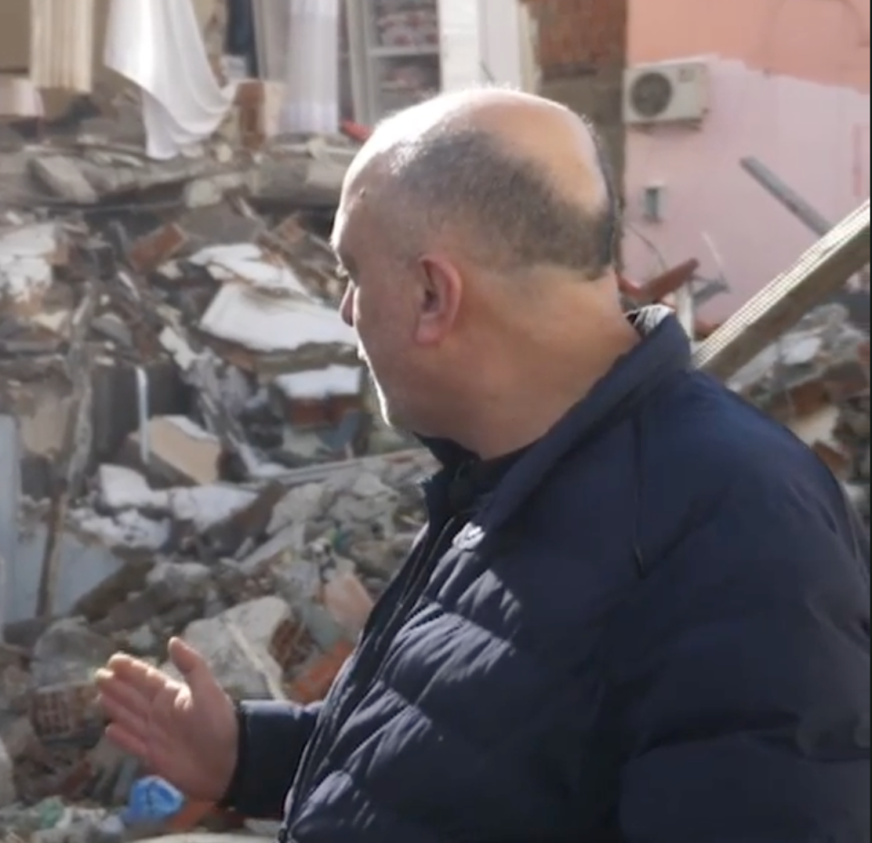 Ahmat Yilmaz stares out the skeleton of his destroyed family home in Tut (Sky News)