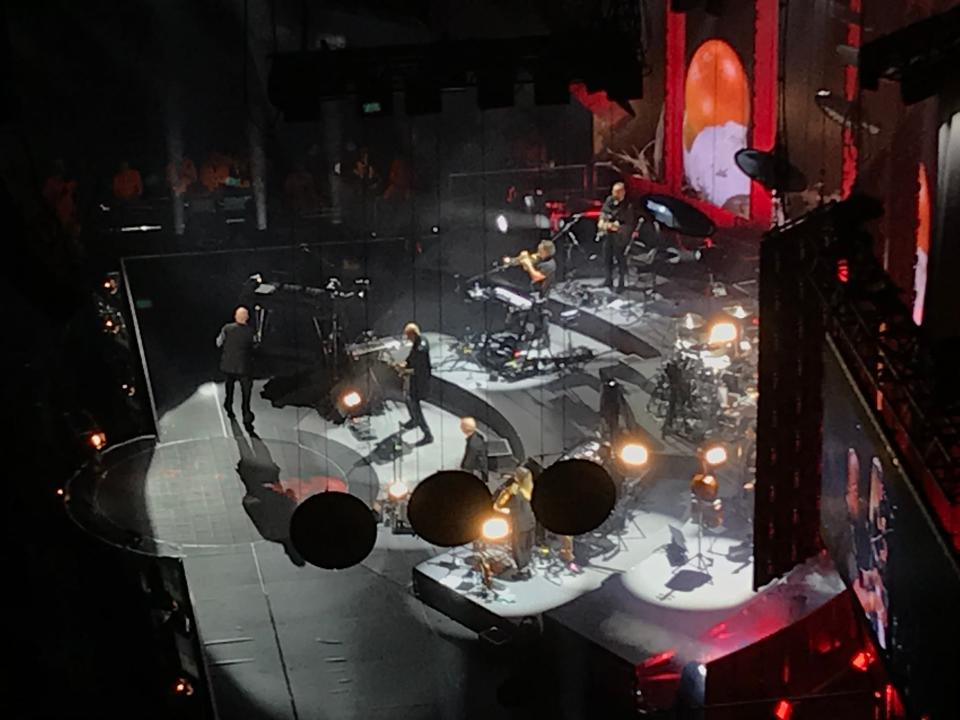 A glimpse of the stage for Peter Gabriel's new tour. That's him, with his back to the camera.