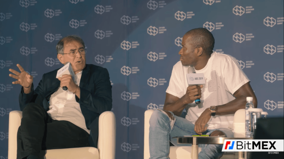 Nouriel Roubini and Arthur Hayes debating at Taipei