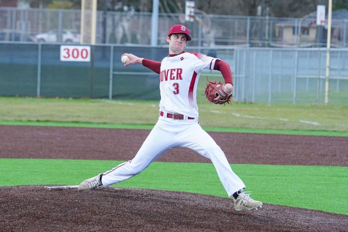 Dover&#39;s Ayden Hall gets set to fire a pitch.