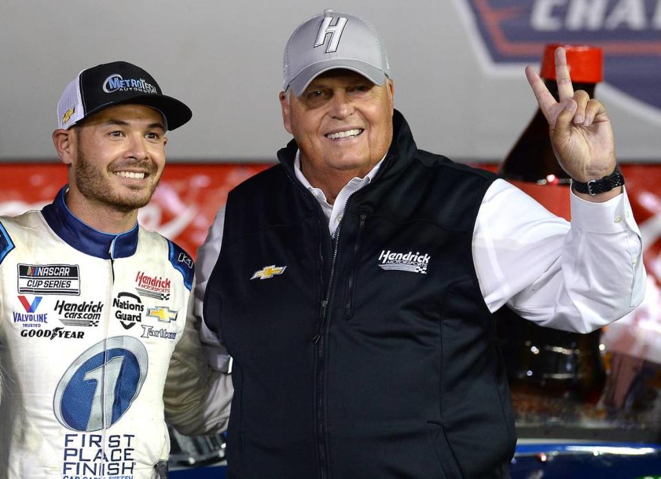 NASCAR driver Kyle Larson, left and team owner Rick Hendrick, right, celebrate winning the Coca-Cola 600 at Charlotte Motor Speedway in Concord, NC on Sunday, May 30, 2021.