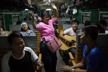 Catholics from Kachin state travel during a two-day train trip from Myitkyina to Yangon to attend Pope Francis' visit to Myanmar next week, November 23, 2017. REUTERS/Ann Wang