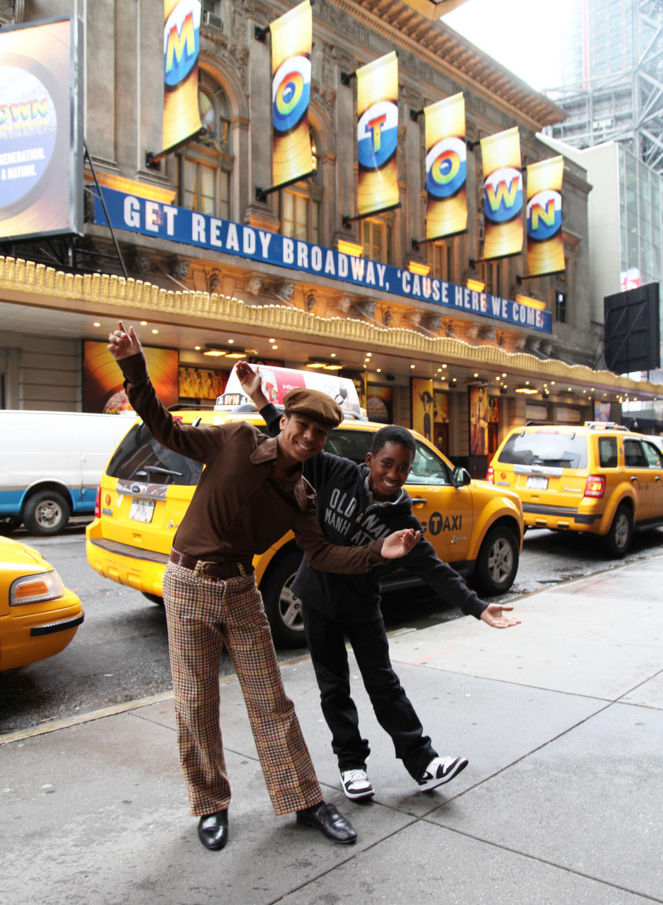 This March 25, 2013 photo shows actors Jibreel Mawry, left, and Raymond Luke Jr. posing outside the Lunt-Fontanne Theatre in New York, where their show "Motown: The Musical," is playing. The two 12-year-olds are alternating taking on the roles of young Michael Jackson, young Stevie Wonder and a young Berry Gordy. (AP Photo/Mark Kennedy)