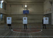 Armenians fill their ballot papers at a polling station during an early parliamentary election in Yerevan, Armenia, Sunday, Dec. 9, 2018. The charismatic 43-year-old Nikol Pashinian took office in May after spearheading massive protests against his predecessor's power grab that forced the politician to step down. (Vahan Stepanyan/PAN Photo via AP)