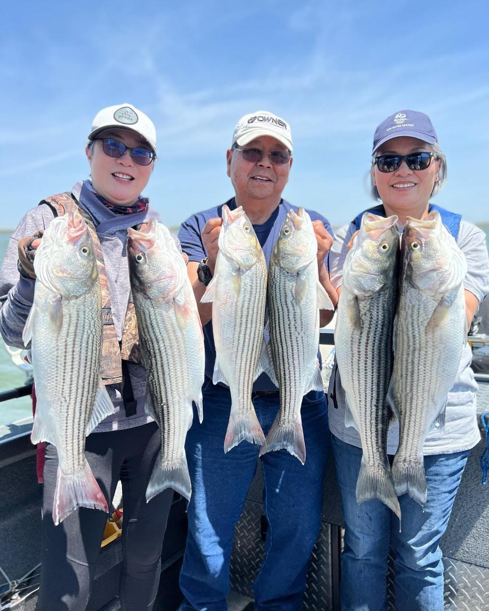 These three anglers successfully battled striped bass while fishing the Delta with Captain Jeff Soo Hoo.