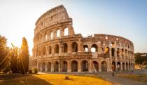 <p>The origins of the Colosseum date back to 72 A.D., when emperor Vespasian originally commissioned an amphitheater on the grounds of the Domus Aurea complex. Vespasian didn’t live to see the project completed, but his son, Titus held games for 100 days and nights to inaugurate the staggering structure. </p><p>It’s said that one of those games included a staged <a href="http://www.bbc.co.uk/history/ancient/romans/colosseum_01.shtml" rel="nofollow noopener" target="_blank" data-ylk="slk:sea battle;elm:context_link;itc:0;sec:content-canvas" class="link ">sea battle</a> where the Colosseum was filled with water so ships could easily move throughout. As archaeologists continue to restore the amphitheater, many believe the decorative hallways, outside arches, and facade were once painted in bright colors.</p>