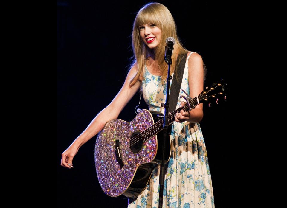 Grammy award winning artist Taylor Swift performs during the Walmart Stores Inc. shareholders' meeting in Fayetteville, Ark., Friday, June 1, 2012. (AP Photo/April L. Brown)