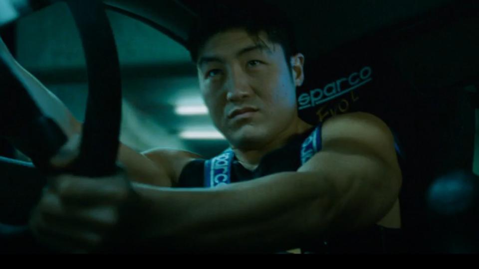 Brian Tee as DK driving a car in Tokyo Drift