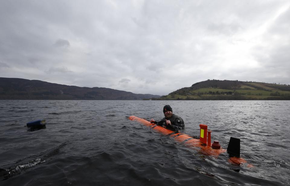 John Haig alongside the Munin AUV (Autonomous Underwater Vehicle) at Loch Ness, as Nessie hunters were left disappointed when monster remains uncovered at the bottom of the loch turned out to be a 1970s film prop.