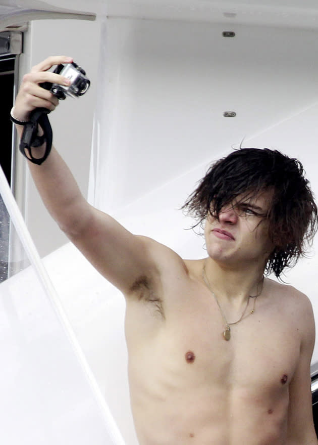 Celebrity photos: One Direction have received a lot of attention this week by hanging out in Australia with their tops off. Harry Styles took the opportunity to take photographs of himself whilst the band hung out on a yacht.