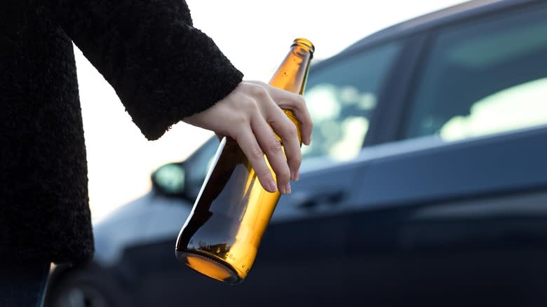 beer bottle and car