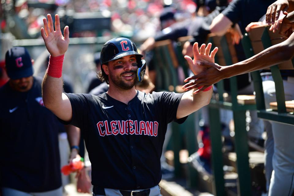 Guardians catcher Austin Hedges is greeted after scoring a sixth-inning run against the Angels, May 26, 2024, in Anaheim.