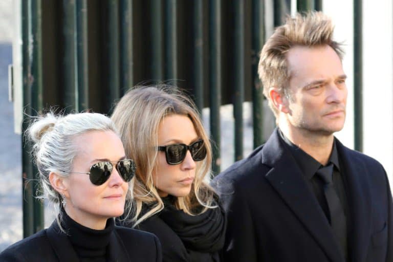 Laeticia Hallyday, Laura Smet et David Hallyday (de G à D) lors des funérailles de Johnny Hallyday à l'église de la Madeleine à Paris le 9 décembre 2017 - ludovic MARIN © 2019 AFP